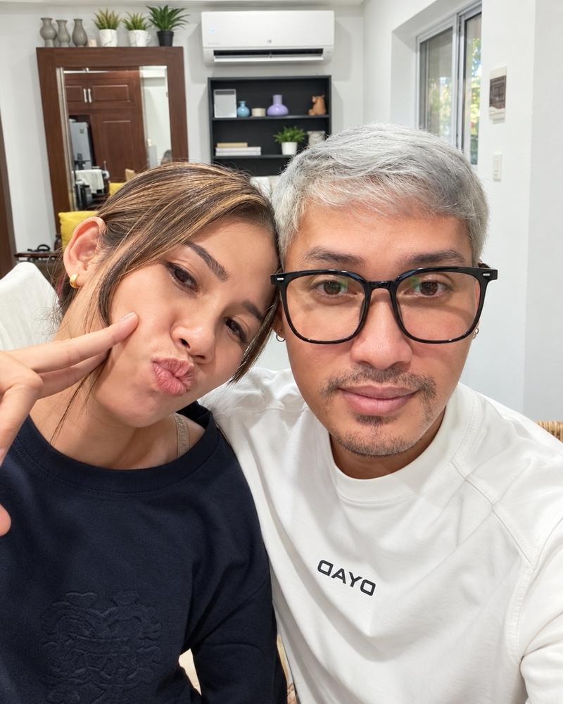 Yanuth beside a client with long, light brown hair